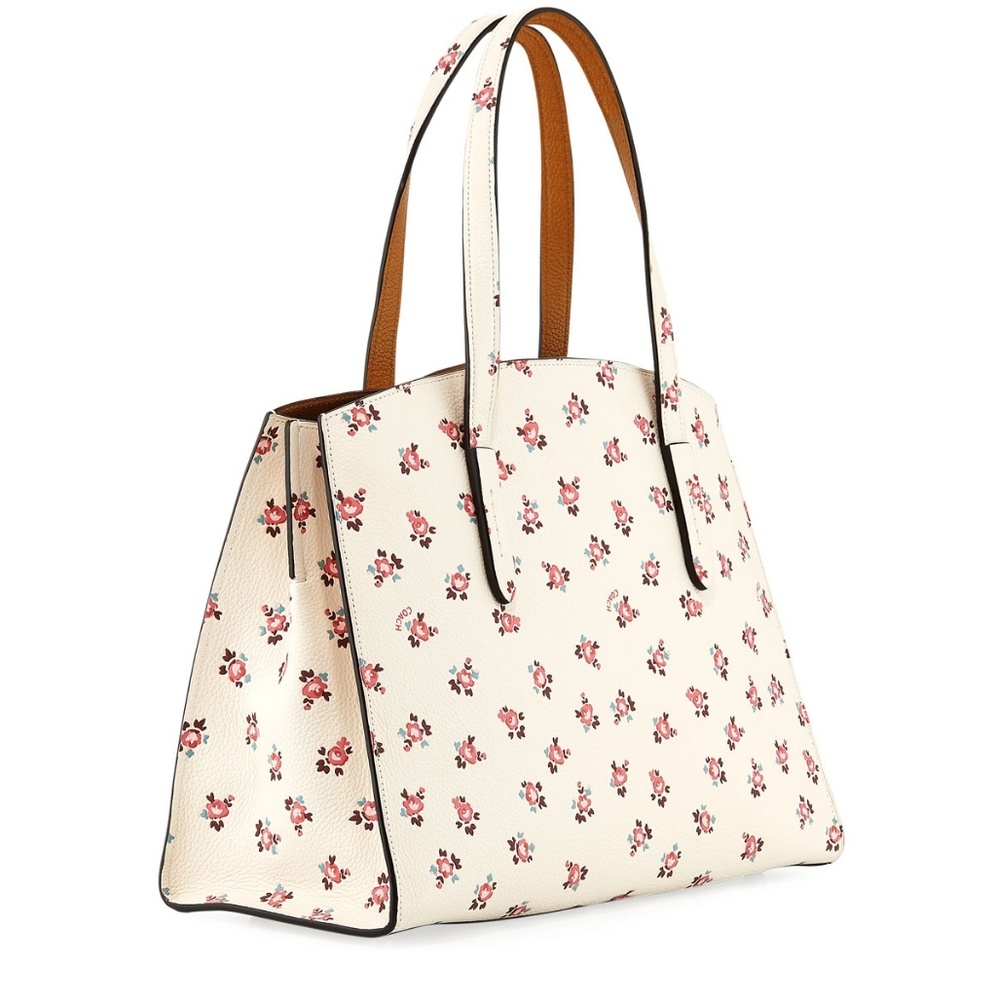 Coach Charlie Carryall floral bloom